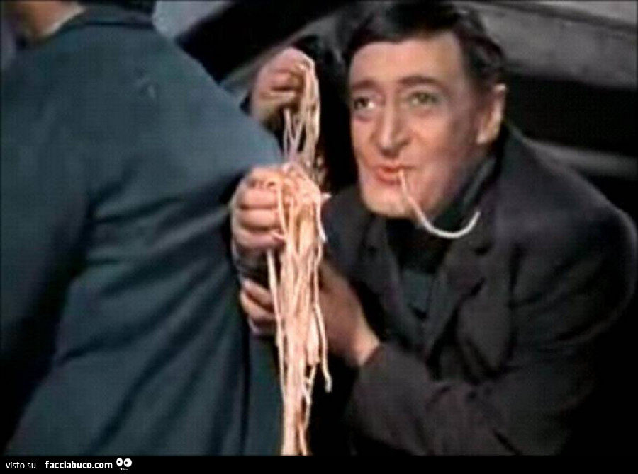 Totò mangia gli spaghetti con le mani